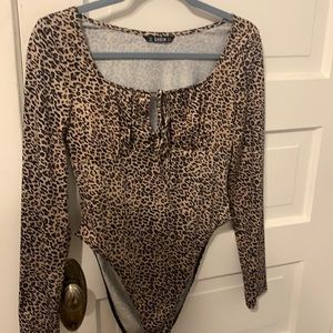 Long-sleeve cheetah print bodysuit, size Medium